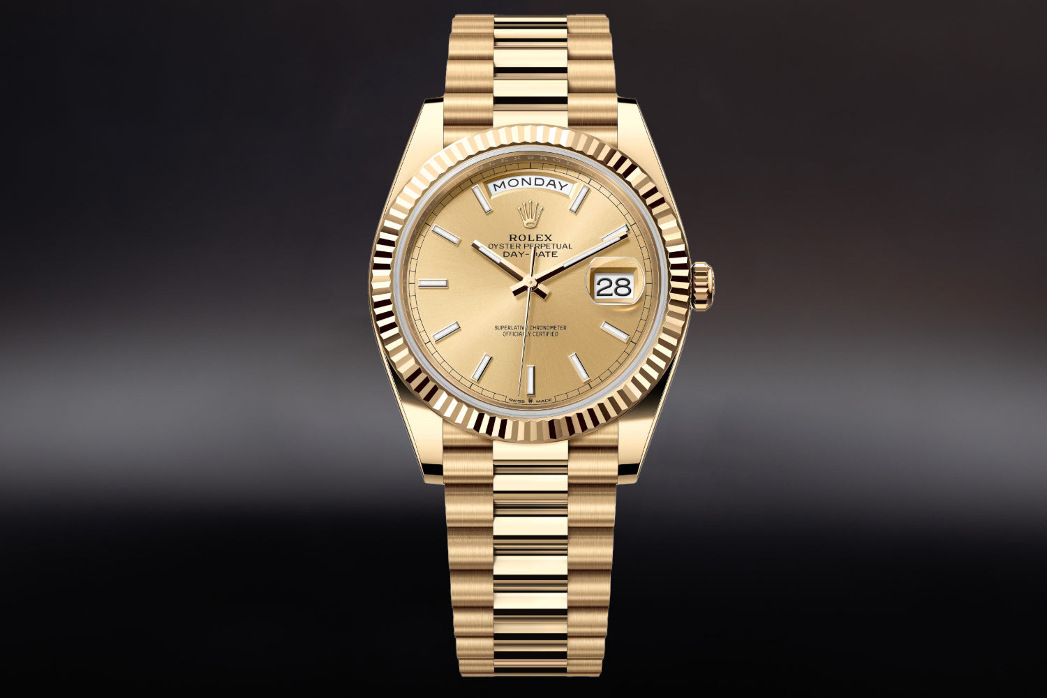 Rolex Day-Date 40 18K Yellow Gold with fluted bezel and Champagne Dial 228238 on president bracelet