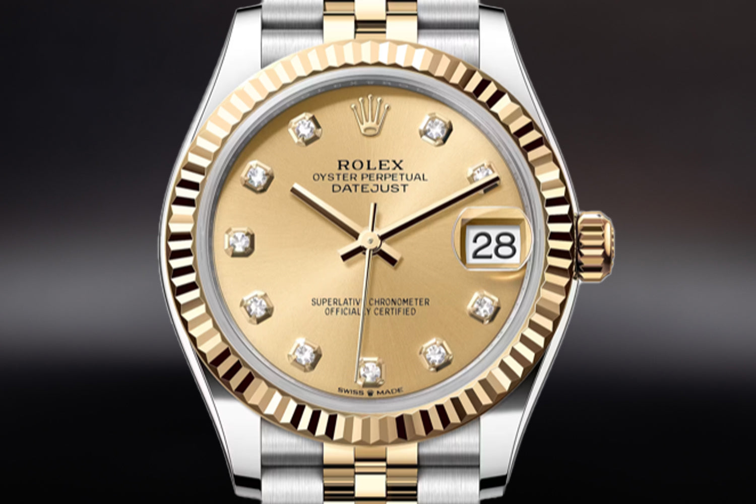 Rolex Datejust 31 Two Tone stainless steel and 18K Yellow Gold Rolesor with fluted bezel and Champagne Diamond Set Dial 278273