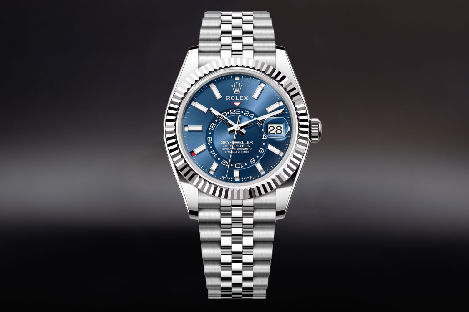 Rolex Sky-Dweller stainless steel with 18K white gold fluted bezel and Blue Dial 336934 on jubilee bracelet