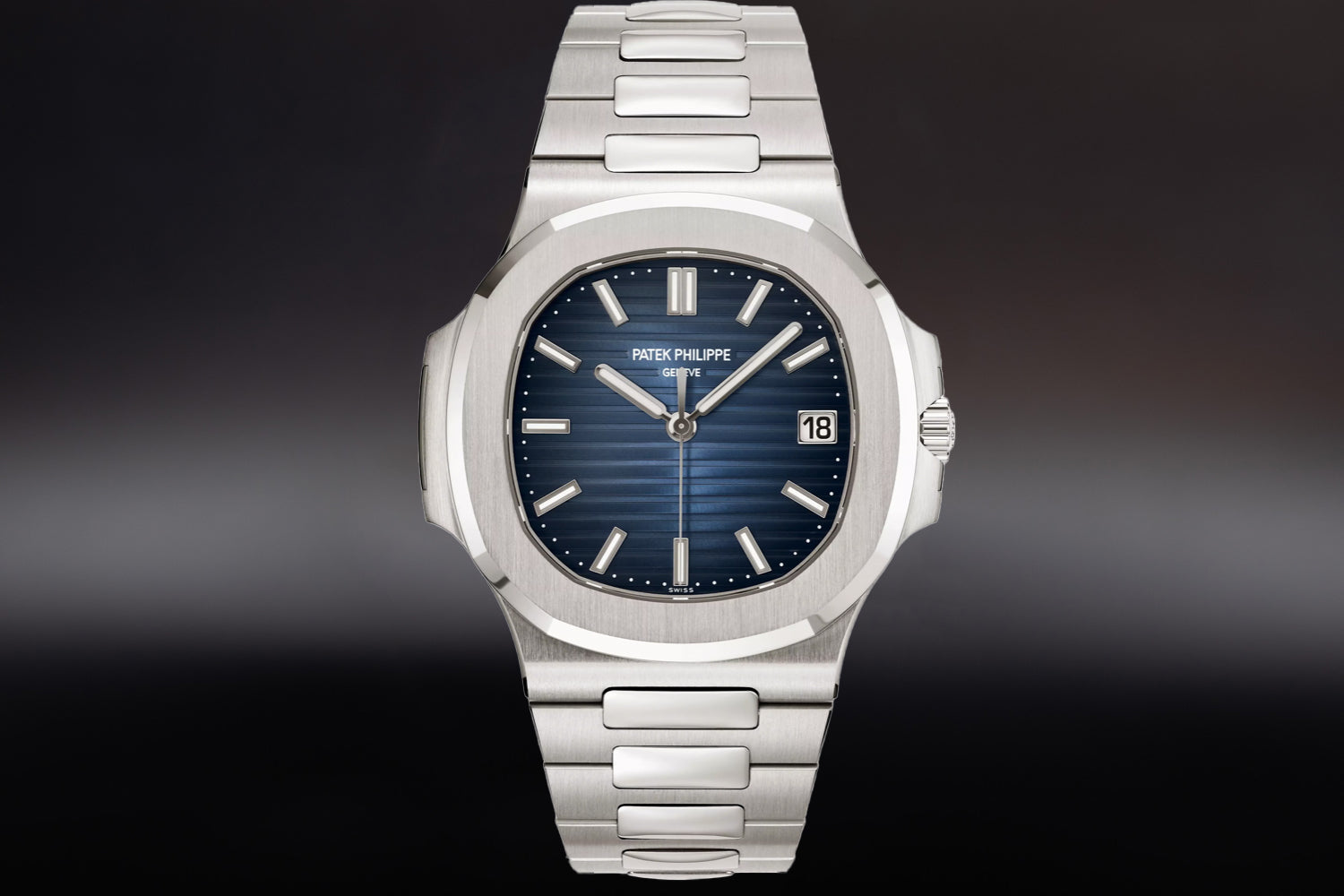Patek Philippe Nautilus 18K White Gold Blue Dial 5811/1G-001 with integrated bracelet