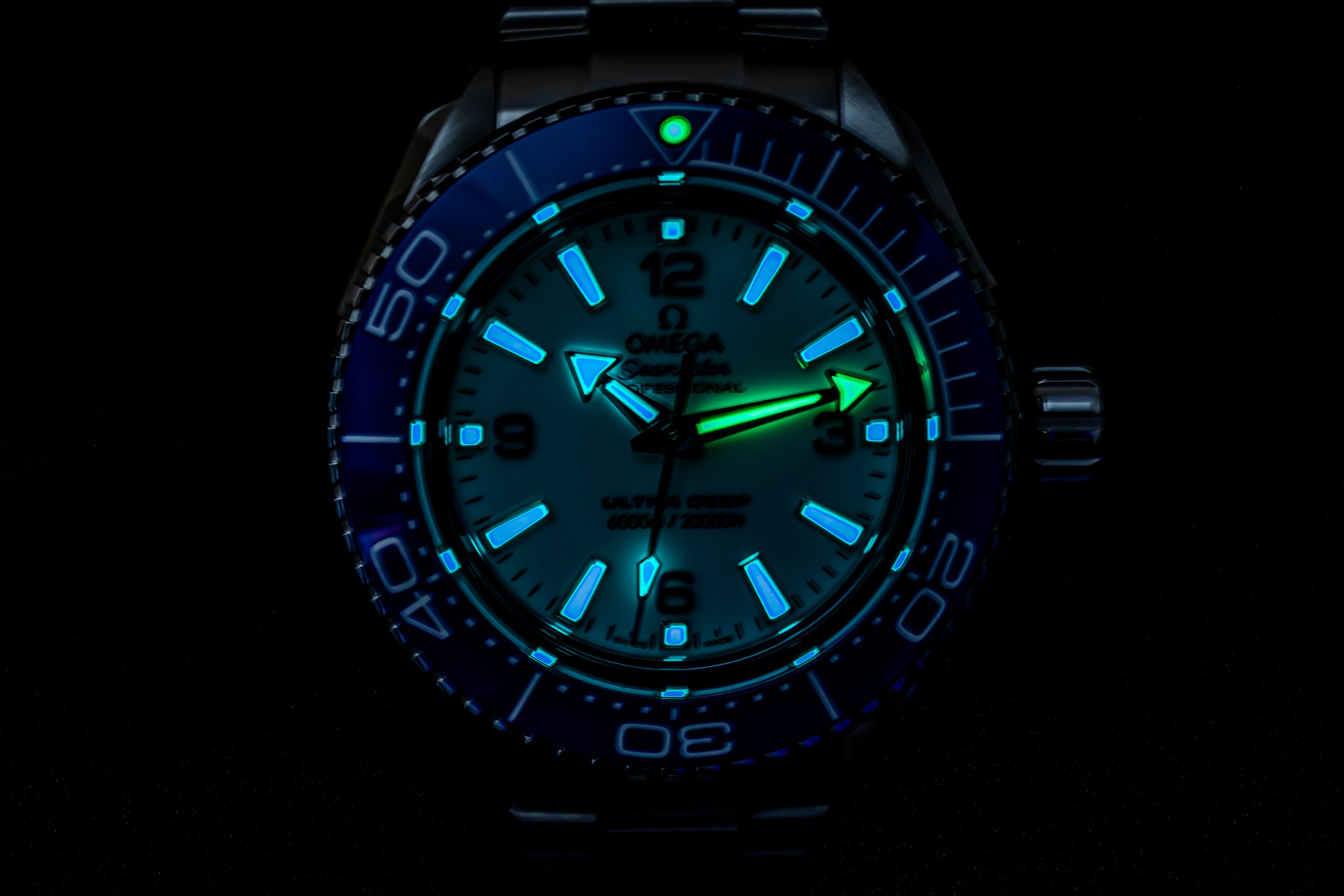 Omega Seamaster Planet Ocean Ultra Deep 6000M stainless steel with white dial and blue ceramic bezel 215.30.46.21.04.001 lume