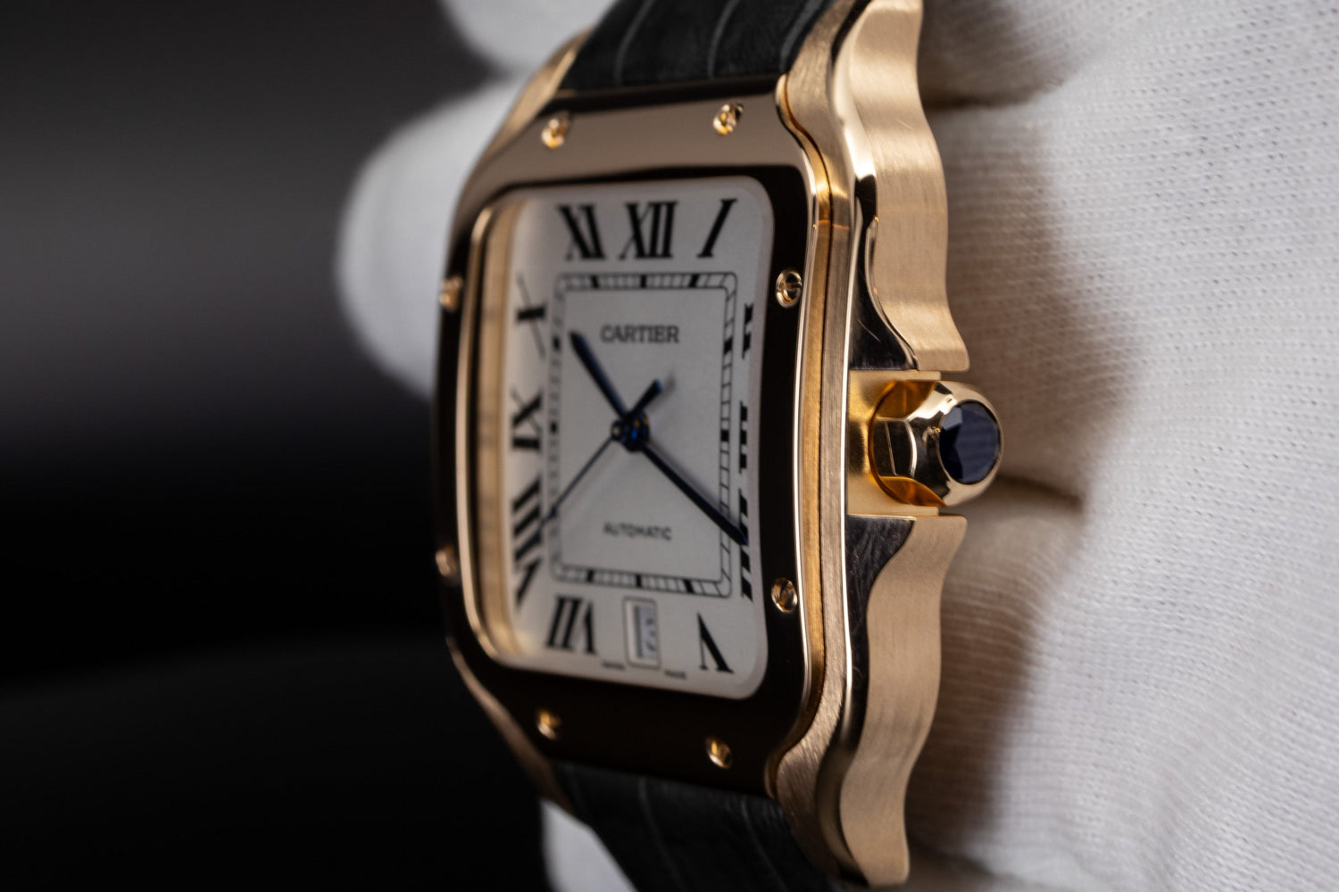 Cartier Santos de Cartier luxury watch featuring brushed rose gold case sides and fixed screw down polished bezel