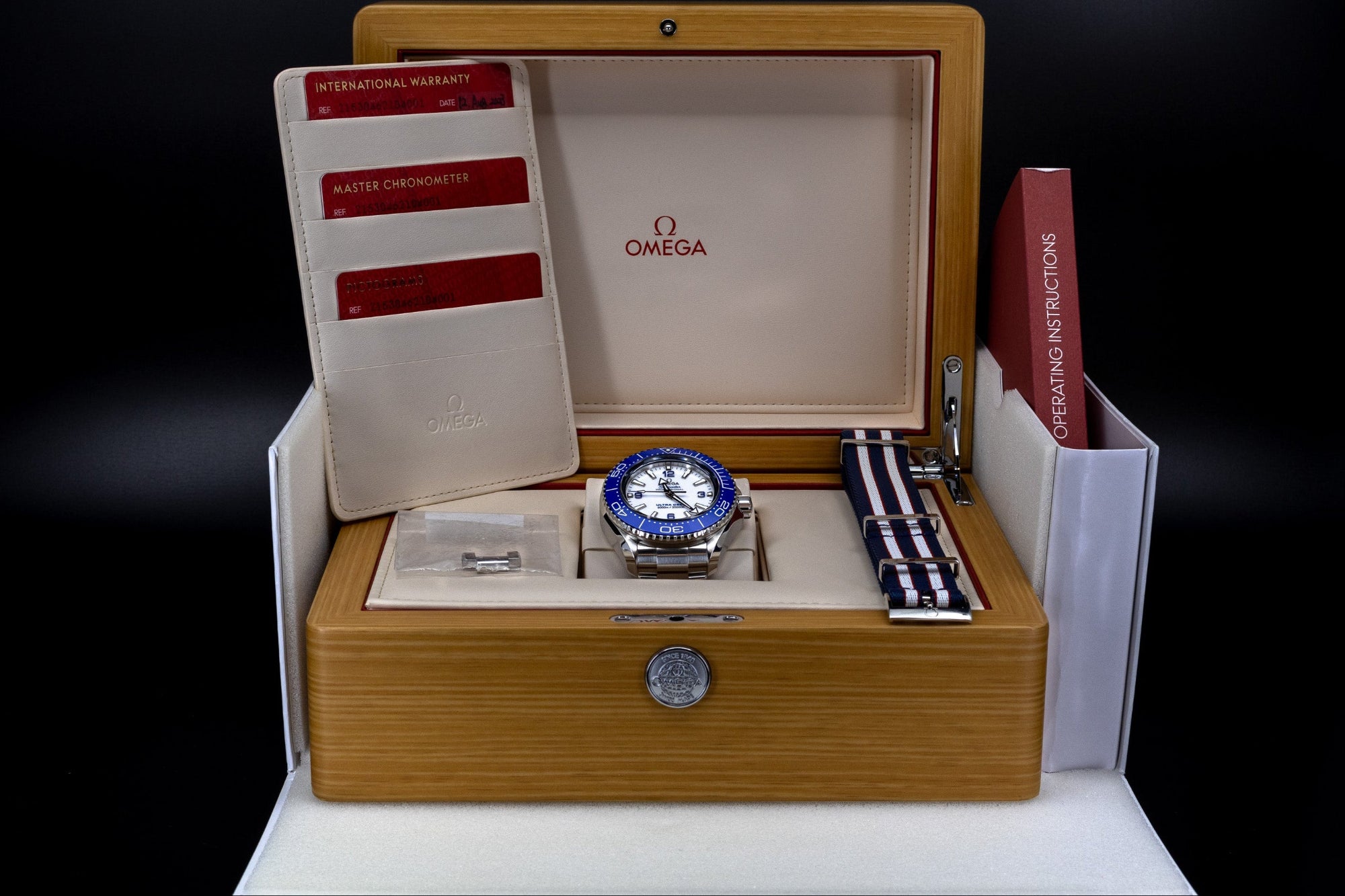 Omega Seamaster luxury watch full set with original box, papers, warranty cards, and accessories
