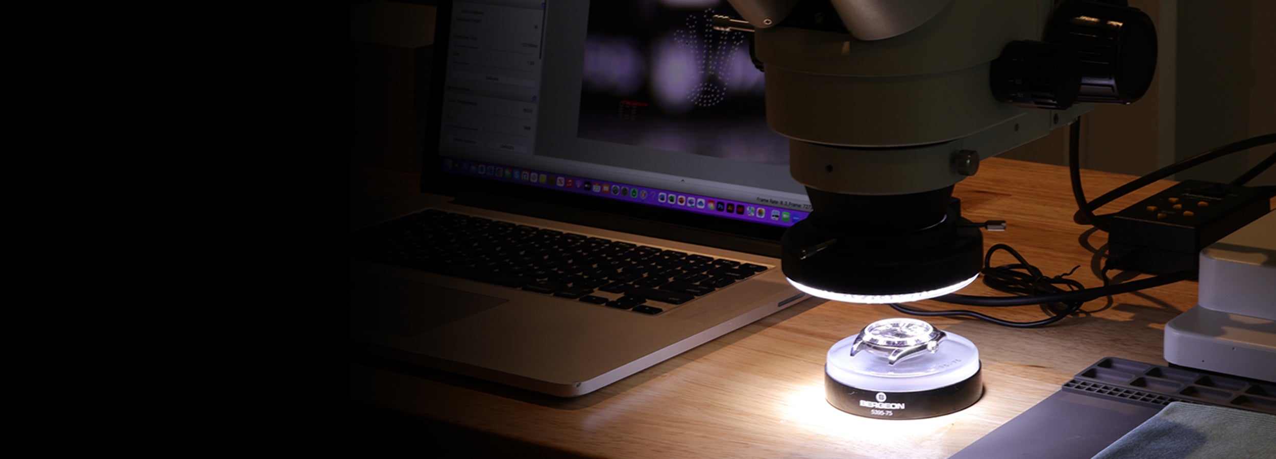 Luxury watch verification workstation with microscope inspection and diagnostics