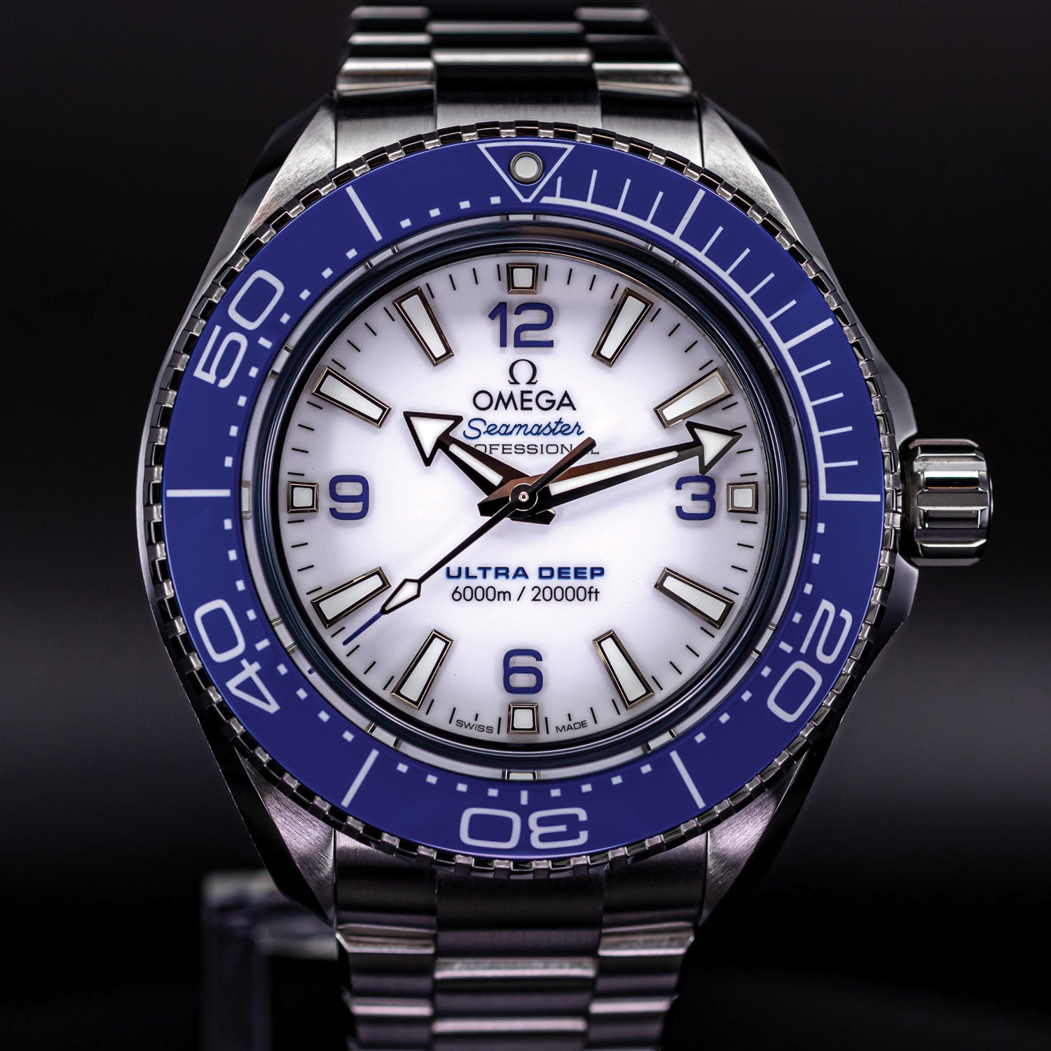 Omega Seamaster Professional Ultra Deep luxury dive watch with blue bezel and white dial