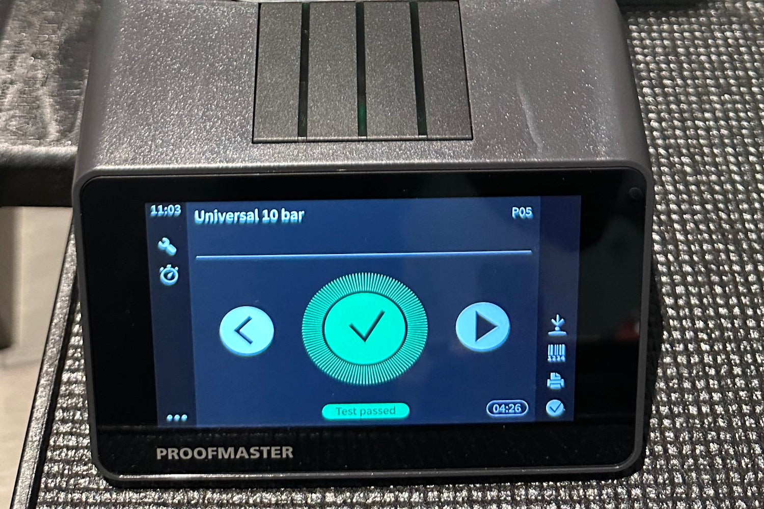 Witschi Proofmaster digital display after completing a 10 bar dry pressure test on luxury watch ensuring waterproof rating