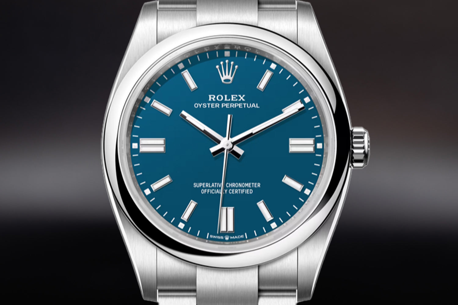 Rolex Oyster Perpetual 36 stainless steel with smooth bezel and Med Blue Dial 126000 