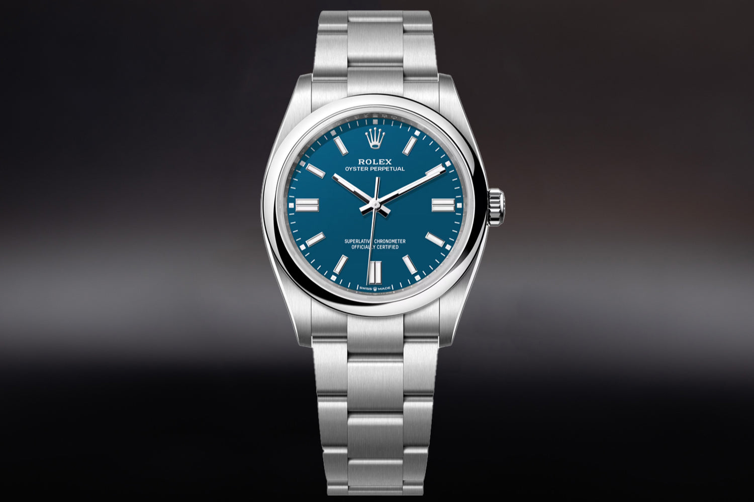 Rolex Oyster Perpetual 36 stainless steel with smooth bezel and Med Blue Dial 126000  on oyster bracelet