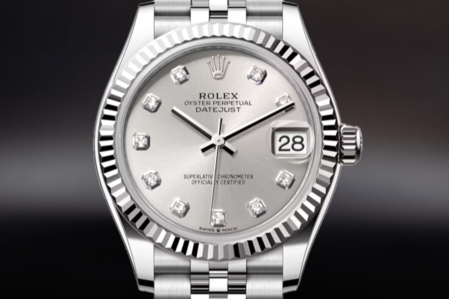 Rolex Datejust 31 stainless steel with 18K white gold fluted bezel and Silver Diamond Set Dial 278274