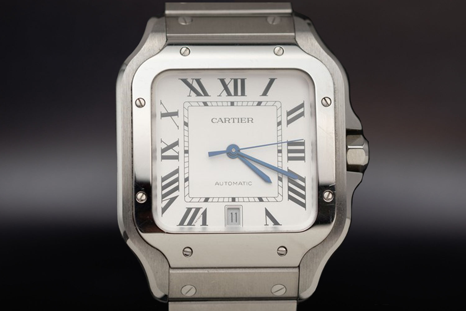Cartier Santos de Cartier luxury sports watch with silver dial and stainless steel bracelet