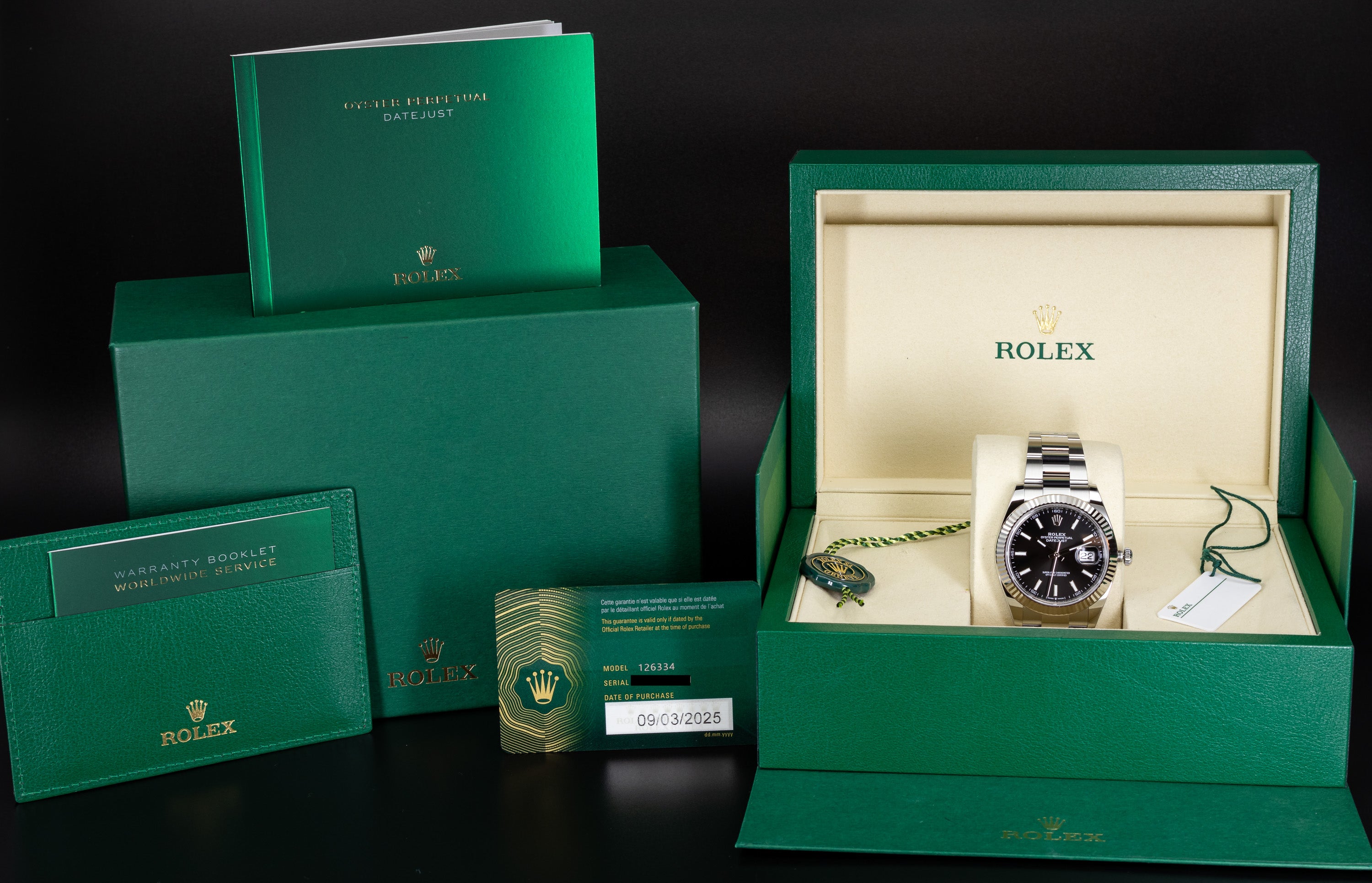 Rolex Datejust 41 126334 with fluted bezel, black dial, and stainless steel oyster bracelet with full kit box and papers