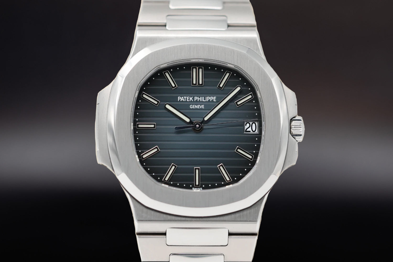 Patek Philippe Nautilus luxury sports watch with blue dial and stainless steel bracelet