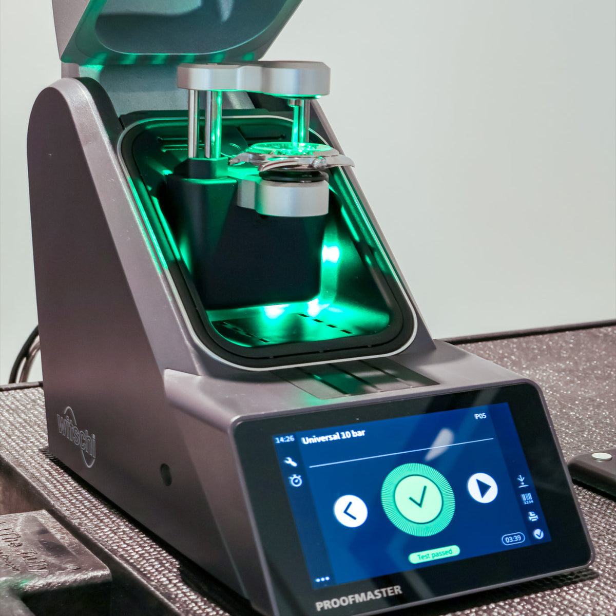 luxury watch authentication and diagnostic testing featuring a dry pressure test for waterproof rating