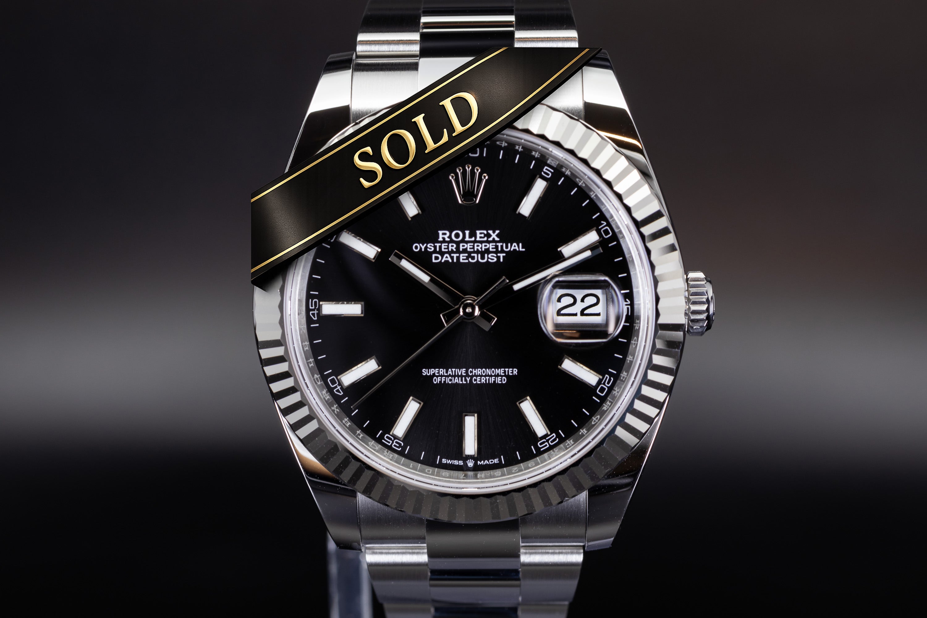 Rolex Datejust 41 126334 with fluted bezel, black dial, and stainless steel oyster bracelet with 'SOLD' ribbon