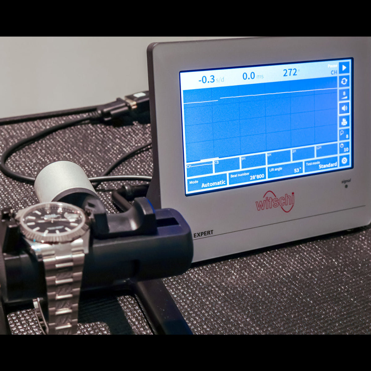 luxury watch authentication and diagnostics checking timing on a timegrapher