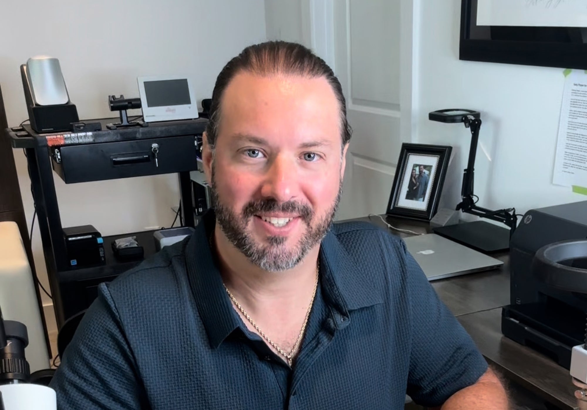 Les Stewart, founder of Finest Kind, at a luxury watch verification workspace